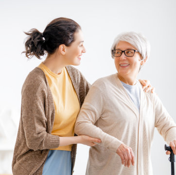 Happy patient and caregiver spending time together