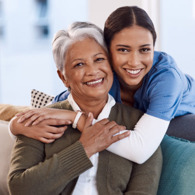 healthcare worker assisting an elderly