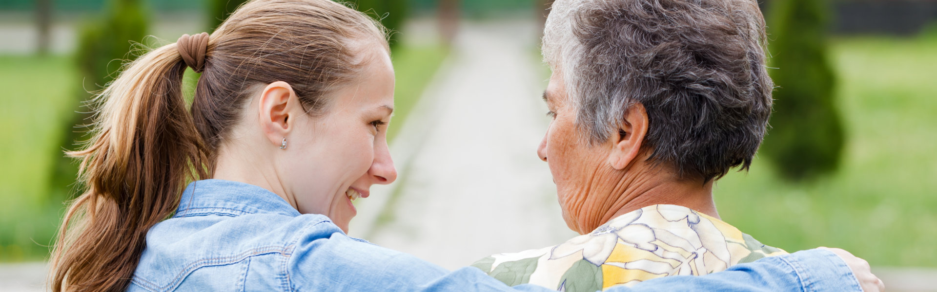 woman and senior woman walking outdoors