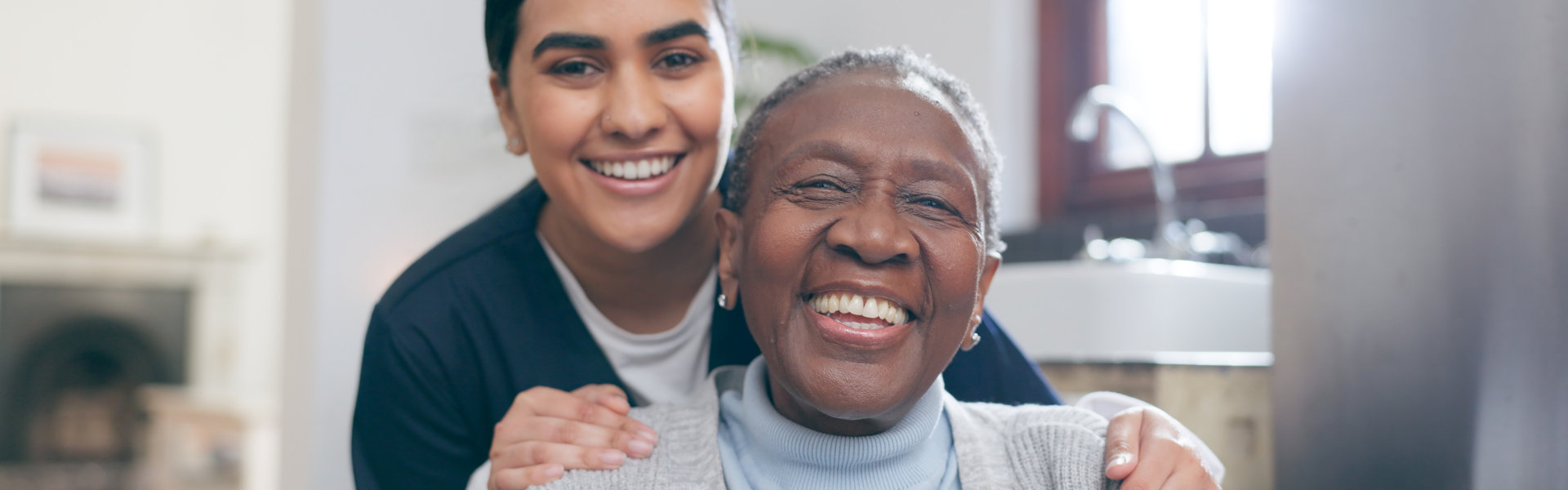 nurse with patient in a wheelchair for discussion at nursing home